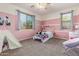 Girly bedroom with twin bed and teepee at 2614 W Florimond Rd, Phoenix, AZ 85086