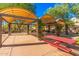 Community picnic area with shaded tables and benches at 2614 W Florimond Rd, Phoenix, AZ 85086