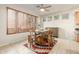 Charming dining area with wood table and seating for four at 2614 W Florimond Rd, Phoenix, AZ 85086