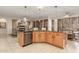 Open concept kitchen with large island and stainless steel appliances at 2614 W Florimond Rd, Phoenix, AZ 85086