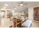 Kitchen with breakfast nook and view into living area at 2614 W Florimond Rd, Phoenix, AZ 85086
