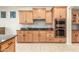 Modern kitchen with granite countertops and stainless steel appliances at 2614 W Florimond Rd, Phoenix, AZ 85086