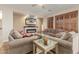 Bright living room with fireplace and comfortable seating at 2614 W Florimond Rd, Phoenix, AZ 85086