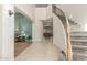 Elegant curved staircase with wood railing at 2614 W Florimond Rd, Phoenix, AZ 85086