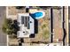 Aerial view showing house with pool and solar panels at 3110 W Paradise Dr, Phoenix, AZ 85029