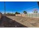 Large backyard area with block wall and gate at 3110 W Paradise Dr, Phoenix, AZ 85029