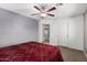 Secondary bedroom with double closet and access to a hall bath at 3331 S Vine St, Chandler, AZ 85248