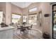 Bright breakfast nook with pool view and a round table at 3331 S Vine St, Chandler, AZ 85248