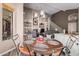 Cozy dining area with a round table and chairs, near kitchen at 3331 S Vine St, Chandler, AZ 85248