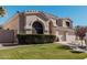 Two-story house with a three-car garage and manicured lawn at 3331 S Vine St, Chandler, AZ 85248