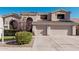 Two-story house with a three-car garage and well-maintained landscaping at 3331 S Vine St, Chandler, AZ 85248