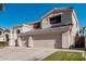 Two-story house with a three-car garage and a large driveway at 3331 S Vine St, Chandler, AZ 85248