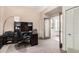 Home office with built-in shelving and large windows at 3331 S Vine St, Chandler, AZ 85248