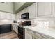 Well-equipped kitchen with stainless steel appliances and ample storage at 3331 S Vine St, Chandler, AZ 85248