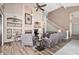 Spacious living room with high ceilings, fireplace, and built-in shelving at 3331 S Vine St, Chandler, AZ 85248