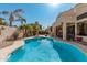 Relaxing kidney-shaped pool with surrounding patio at 3331 S Vine St, Chandler, AZ 85248