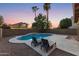 Inviting backyard oasis featuring a sparkling pool and lounge chairs at 343 W Bolero Dr, Tempe, AZ 85284