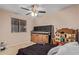 Bedroom with double bed, window, and ceiling fan at 3502 W Ironwood Dr, Phoenix, AZ 85051