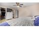 Bright bedroom with a queen-size bed and ample closet space at 3502 W Ironwood Dr, Phoenix, AZ 85051