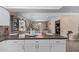 Modern kitchen with white cabinets and a large island at 3502 W Ironwood Dr, Phoenix, AZ 85051