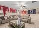 Relaxing living room with sectional sofa and decorative wall hangings at 3502 W Ironwood Dr, Phoenix, AZ 85051