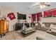 Spacious living room featuring a large sectional sofa and a coffee table at 3502 W Ironwood Dr, Phoenix, AZ 85051