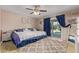 Comfortable main bedroom with king-size bed and access to the pool at 3502 W Ironwood Dr, Phoenix, AZ 85051