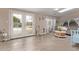 Peaceful sunroom with french doors leading to the pool area at 3502 W Ironwood Dr, Phoenix, AZ 85051
