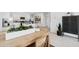 Modern kitchen with granite countertops and stainless steel appliances at 38130 W Bello Ln, Maricopa, AZ 85138