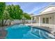 Relaxing pool area with a volleyball net at 3871 W Jasper Dr, Chandler, AZ 85226