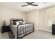 Guest bedroom with metal bed frame and window at 4037 N 155Th Dr, Goodyear, AZ 85395