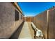 Backyard access with paved pathway, and storage space at 5 E Zinnia Pl, San Tan Valley, AZ 85143