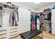 Large walk-in closet with ample shelving and hanging space at 5403 E Cannon Dr, Paradise Valley, AZ 85253