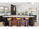 Modern kitchen with stainless steel appliances and an island at 5403 E Cannon Dr, Paradise Valley, AZ 85253