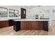 Gourmet kitchen island showcasing granite countertops, two-tone cabinets, and modern stainless steel dishwasher at 5403 E Cannon Dr, Paradise Valley, AZ 85253