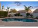 Relaxing kidney shaped pool in backyard oasis at 5403 E Cannon Dr, Paradise Valley, AZ 85253