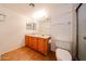 Bathroom with double sink vanity and a large mirror, providing ample space at 7808 W Mescal St, Peoria, AZ 85345