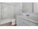Clean bathroom, shower bathtub combo, and white vanity at 9317 E Static Ave, Mesa, AZ 85212