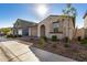 Modern home with a two-car garage and desert landscaping at 9317 E Static Ave, Mesa, AZ 85212