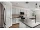 Modern kitchen with granite countertops and stainless steel appliances at 9317 E Static Ave, Mesa, AZ 85212