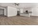 Open concept kitchen with island, granite countertops, and stainless steel appliances at 9317 E Static Ave, Mesa, AZ 85212