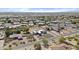 Aerial showcases the property's unique design, large lot, and lush surroundings at 9437 W Avenida Del Sol Ave, Peoria, AZ 85383