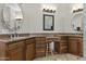Bathroom with double sinks, granite countertops, and separate vanity area at 9437 W Avenida Del Sol Ave, Peoria, AZ 85383