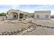 Stunning single-story home with decorative fountain, drought-resistant landscaping, and covered driveway at 9437 W Avenida Del Sol Ave, Peoria, AZ 85383