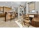 Open floor plan with a large kitchen island, breakfast bar, and seating area at 9437 W Avenida Del Sol Ave, Peoria, AZ 85383