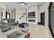 Cozy living room with modern fireplace and comfortable seating at 9437 W Avenida Del Sol Ave, Peoria, AZ 85383