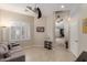 Cozy den with comfortable seating and access to other rooms at 9610 E Rocky Lake Dr, Sun Lakes, AZ 85248
