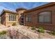 House exterior featuring a walkway and landscaping at 9610 E Rocky Lake Dr, Sun Lakes, AZ 85248