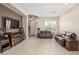 Living room with fireplace and comfortable seating at 9610 E Rocky Lake Dr, Sun Lakes, AZ 85248