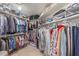 Large walk-in closet with ample shelving and hanging space at 9610 E Rocky Lake Dr, Sun Lakes, AZ 85248